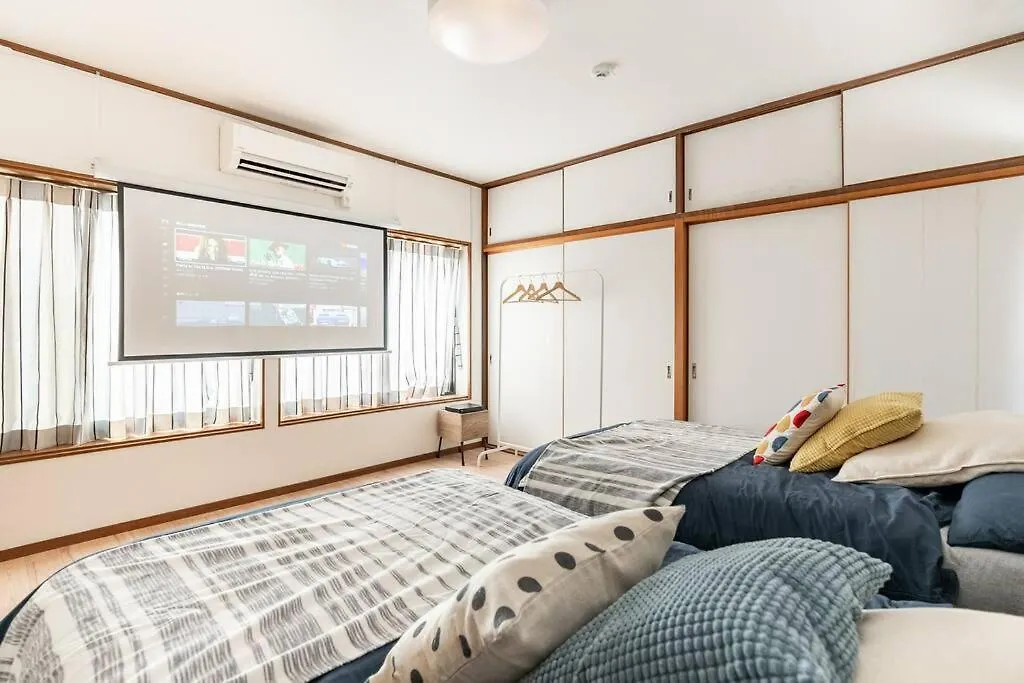 Apartment Ｕｓｊ,万博,梅田への交通抜群,ファミリーで安心のguesthouse-泉- Osaka