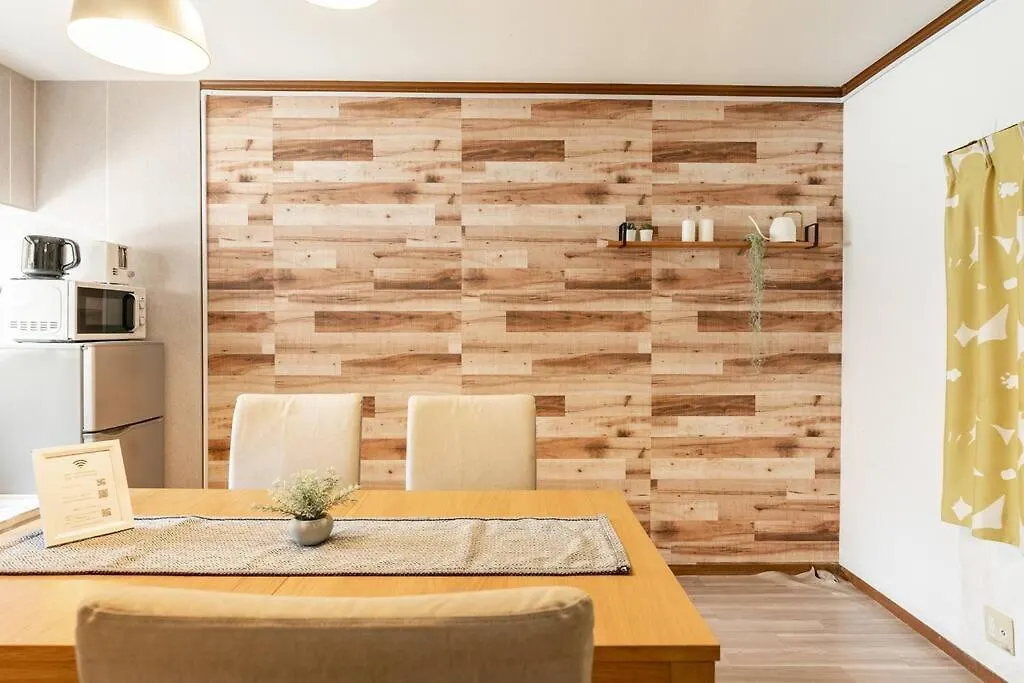 Apartment Ｕｓｊ,万博,梅田への交通抜群,ファミリーで安心のguesthouse-泉- Osaka